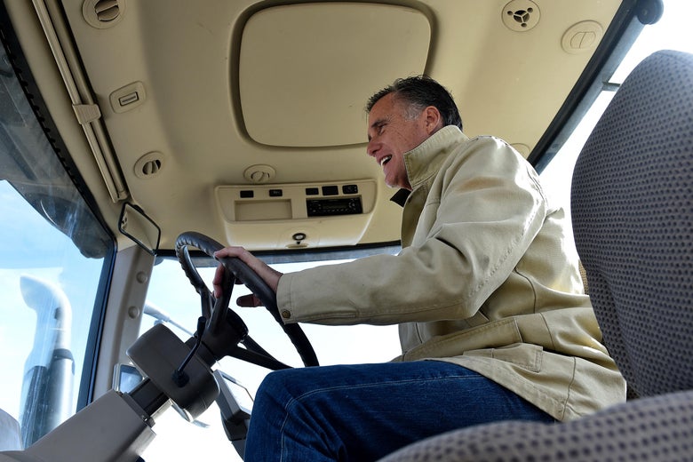 OGDEN, UT - FEBRUARY 16: Candidate for senate Mitt Romney at the wheel of a John Deere tractor as he tours Gibson's Green Acres Dairy on February 16, 2018 in Ogden, Utah. Mr. Romney is running for a U.S. Senate seat from Utah, currently held by Sen. Orrin Hatch, who announced his retirement after the current term expires. (Photo by Gene Sweeney Jr./Getty Images)